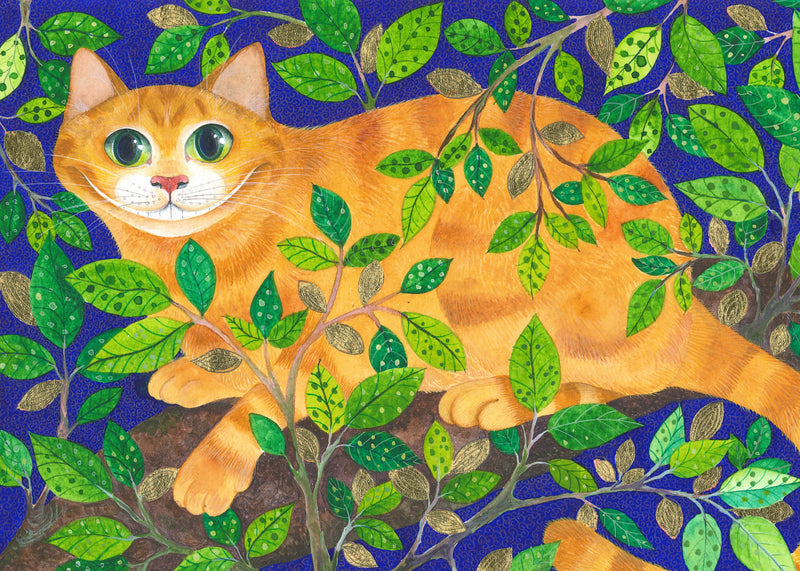 Ginger Tabby Cat Hidden in Lush Green Foliage